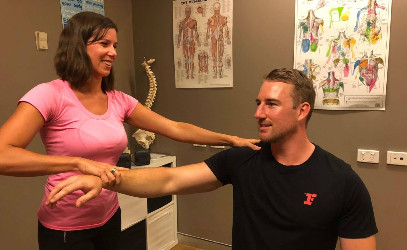 Dr Miki treating a patient at Dynamic Chiropractic, Brisbane CBD