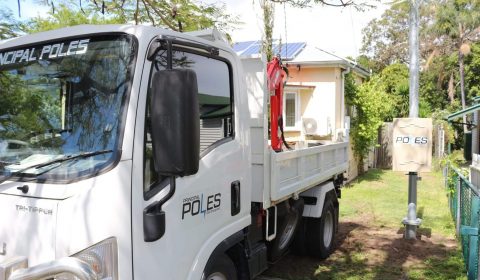 Principal Poles truck beside an installed temporary power pole